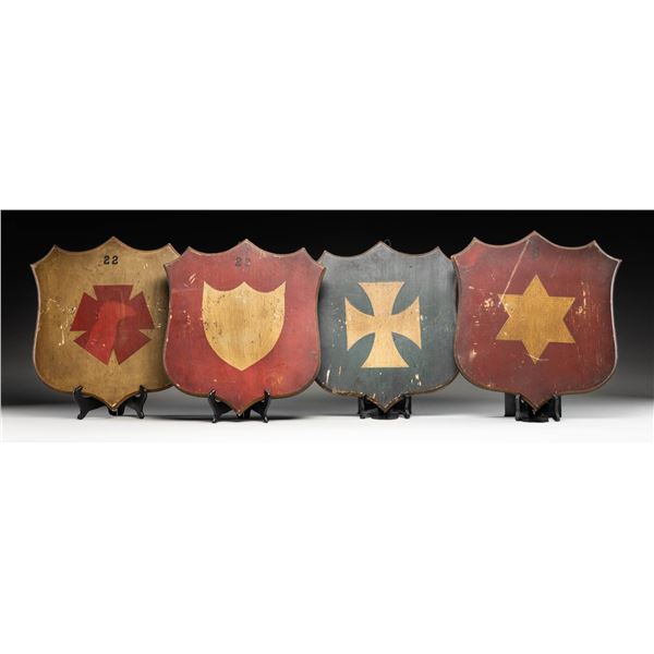 4 EARLY PAINTED WOODEN SHIELDS FOR HEADQUARTERS