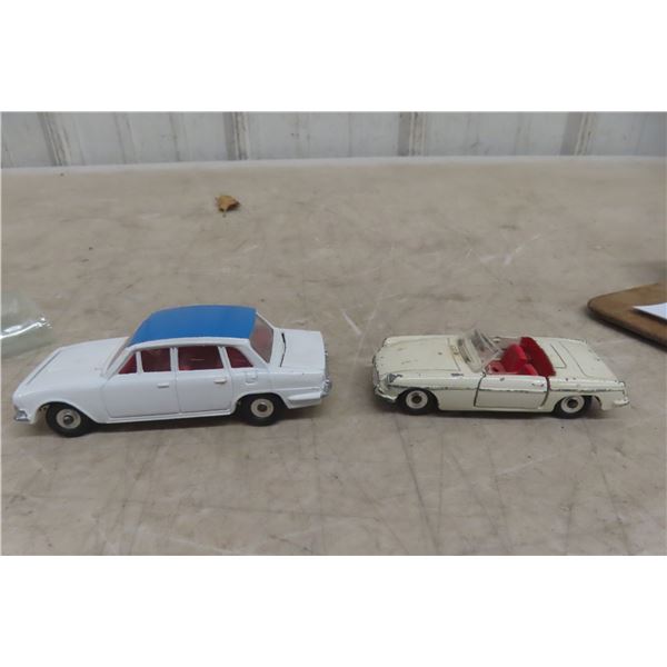 Two Dinky Cars: MG #113 (3") and Triumph #135 (4")