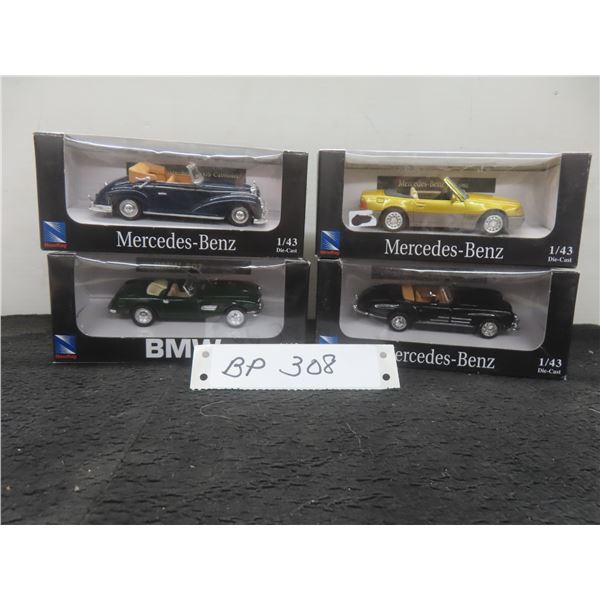 Four 1/43 Scale Die-Cast Cars: Mercedes-Benz 1957 Roadster, 1955 Cabriolet 300S, 1992 600SL, and