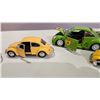 Image 3 : 5 Volkswagen Beetles - Largest is 1957 Beetle 1/24, 1999 BBurago, 2 Small, Transformer Beetle.