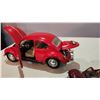 Image 5 : 5 Volkswagen Beetles - Largest is 1957 Beetle 1/24, 1999 BBurago, 2 Small, Transformer Beetle.