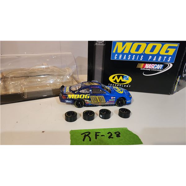 1999 NASCAR Ford Taurus Moog 00 Race Car Champions in Display 1/18 Scale.