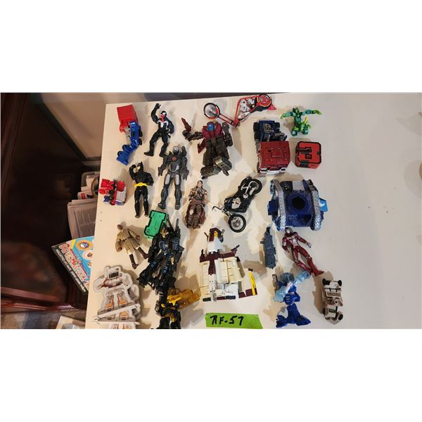 24 Misc. Mini Toys – Transformers & Action Figures.