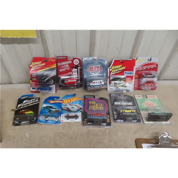 Eleven Packages of 1/64 Die-Cast Super Haulers Including Johnny Lightning and More