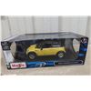 Image 2 : Maisto 1/18 Die-Cast Mini Cooper with Two Gas Station Box Sets, Bonus Items, and Truck
