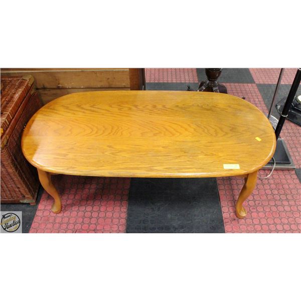 OVAL OAK COFFEE TABLE 48" X 24.5" X 16"