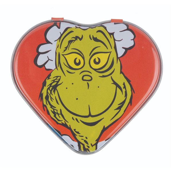 A Heart-Shaped Grinch Collectible Tin.