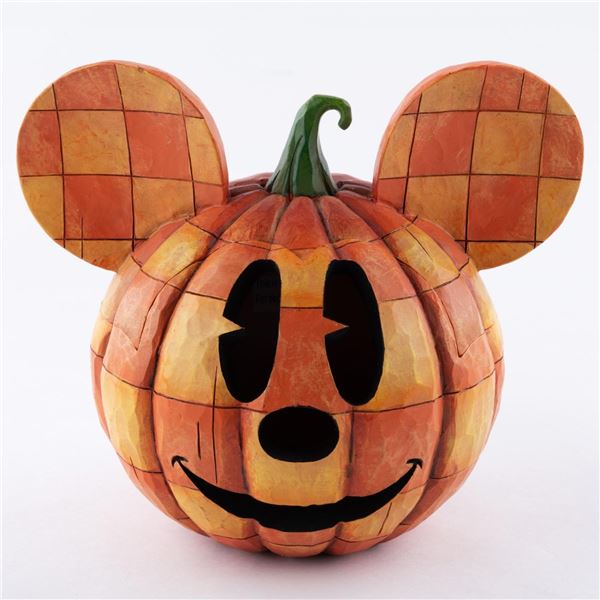 A Mickey Mouse Jack-O-Lantern Pumpkin Container.