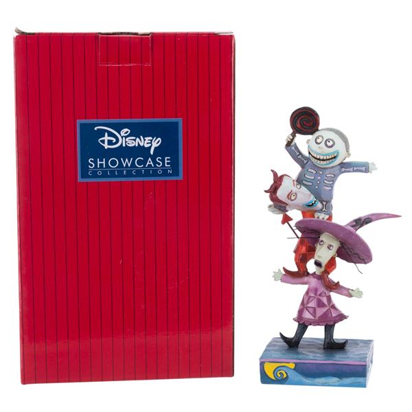 A Disney Traditions "Triple Trouble" Figurine.