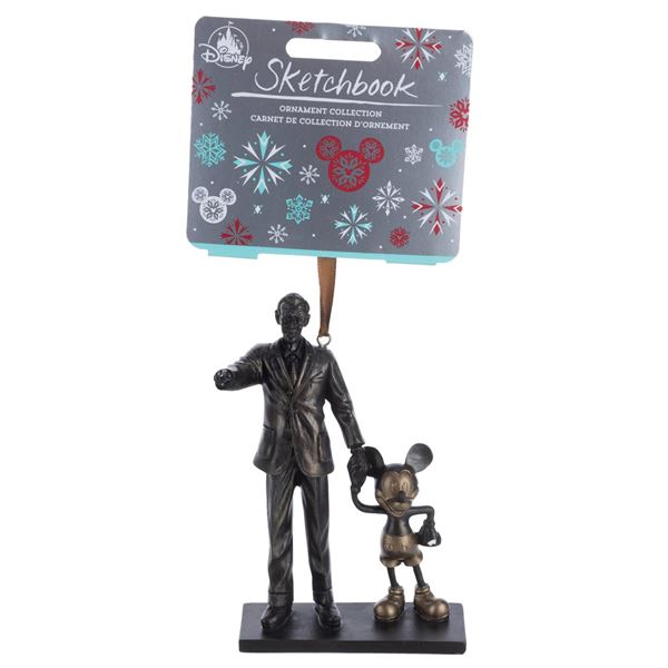 A Walt and Mickey "Partners" Sketchbook Christmas Ornament.