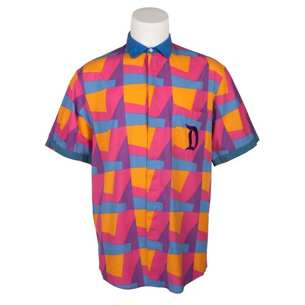 A Multicolored Disneyland "D" Cast Member Shirt.