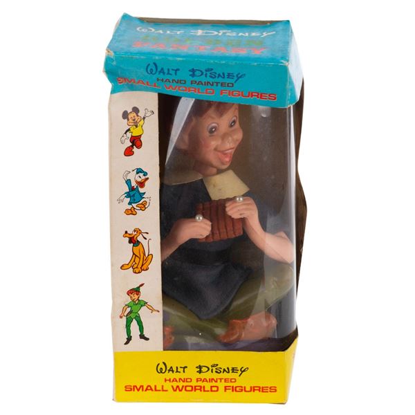 A Golden Fantasy Peter Pan Small World Figure.