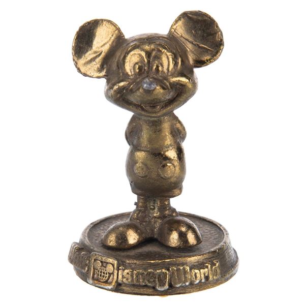 A Walt Disney World Mickey Mouse Paperweight.