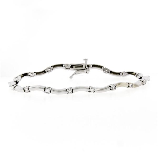 14K White Gold Wavy Link &.88 ctw Round Brilliant Diamond Station Tennis Bracele