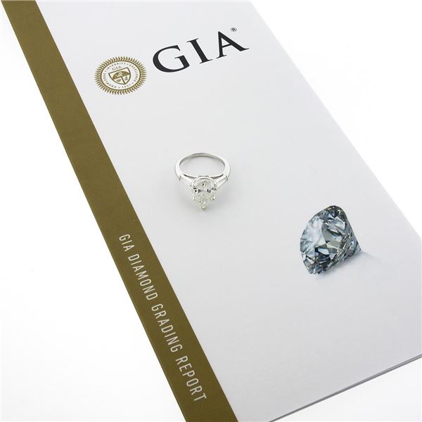 Vintage Platinum 3.62 ctw GIA Pear Brilliant & Baguette Diamond Engagement Ring