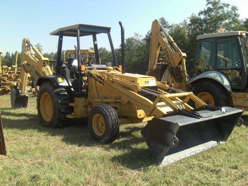 FORD 555D LOADER BACKHOE, J.M. Wood Auction Company, Inc.
