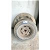 Image 1 : A FIRESTONE P225/70R14 WHEEL AND TIRE WITH A MICHELIN P245/70R17 WHEEL AND TIRE