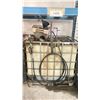 Image 1 : STEEL CAGED LIQUID STORAGE CONTAINER (SOME CONTENTS INSIDE) WITH PUMPS, DISPENSING NOZZLE