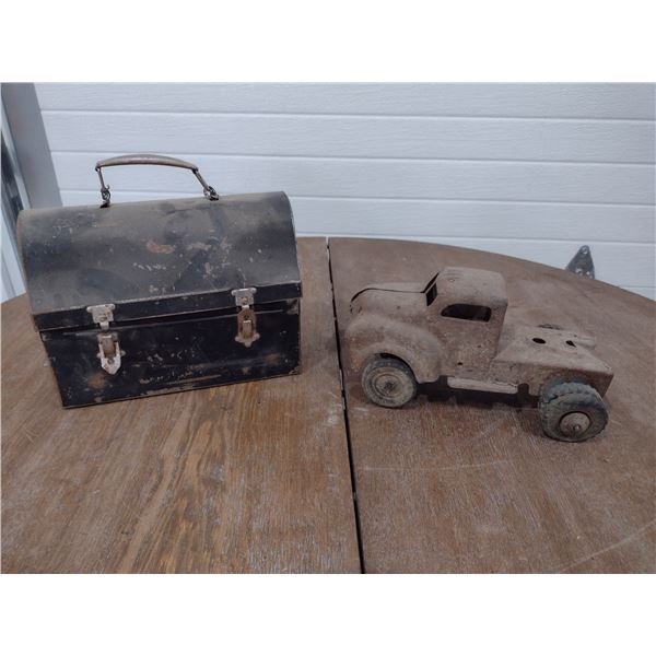tin toy truck and lunch box