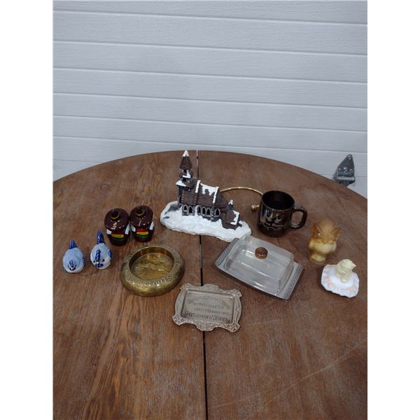 collection of salt and pepper shakers and other ornaments