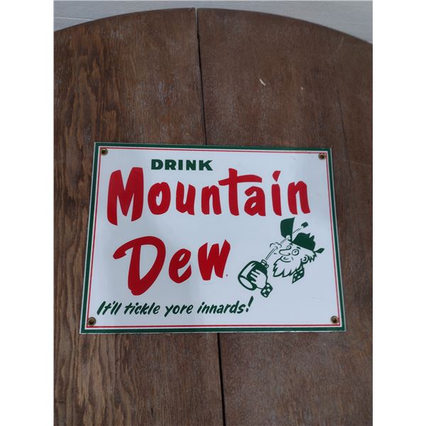 mountian dew tin sign
