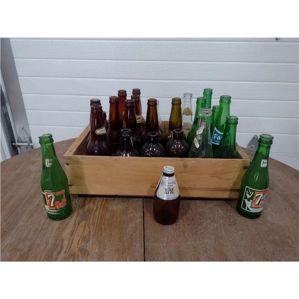 collection of old pop and beer bottles