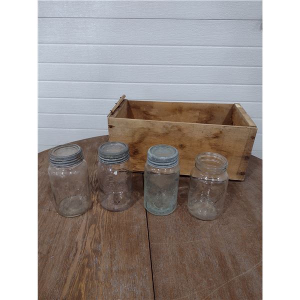 2 crown, 1 mid west and 1 dominion jar with wooden bc fruit crate