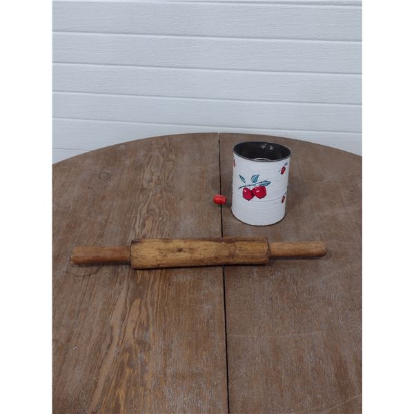 flour sister and wooden rolling pin