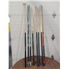 Image 1 : 7 pool cues and a granny.