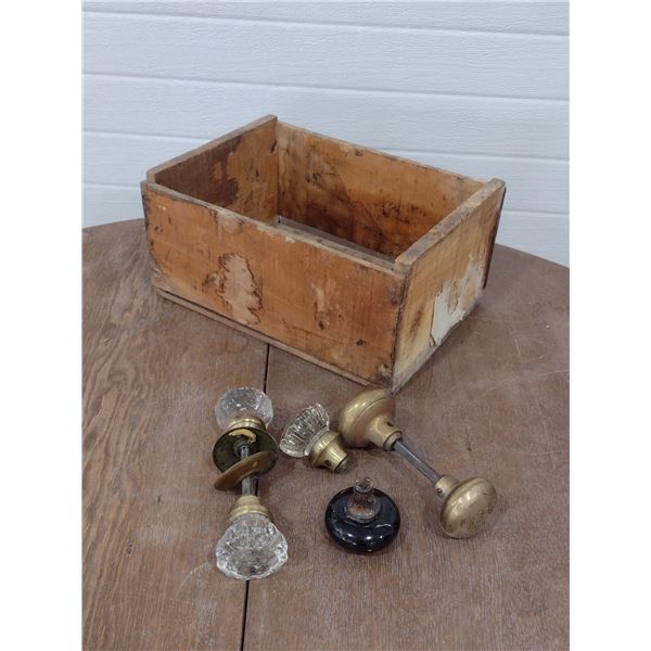 Glass and Brass Antique door knobs with wooden crate