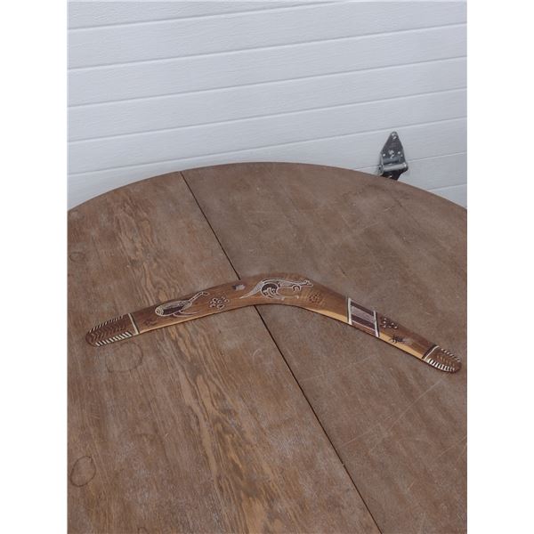 Boomerang with aboriginal carving and painting