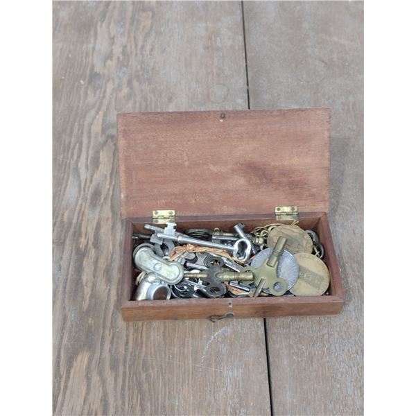 wood box with assorted keys