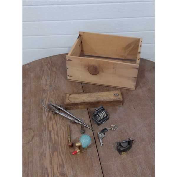assorted desk items with wooden crate