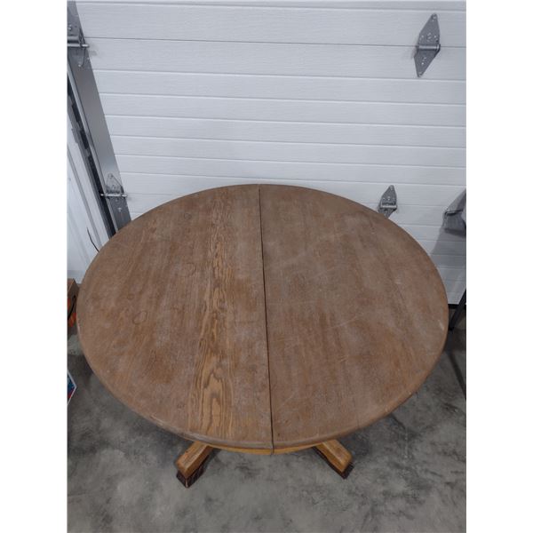 round oak table with three leaves