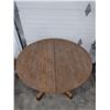Image 1 : round oak table with three leaves