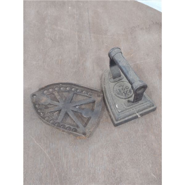 Clothes iron with stand