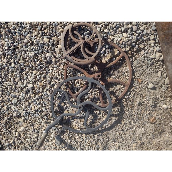 2 old hand cranks and a clothes line pully