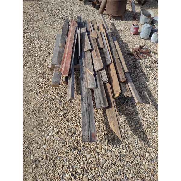 pallet of shorter weathered barn board