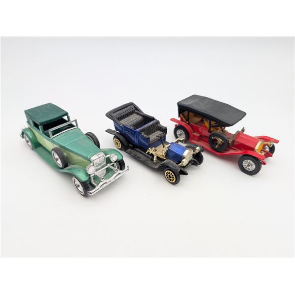 Three Die-cast Matchbox cars