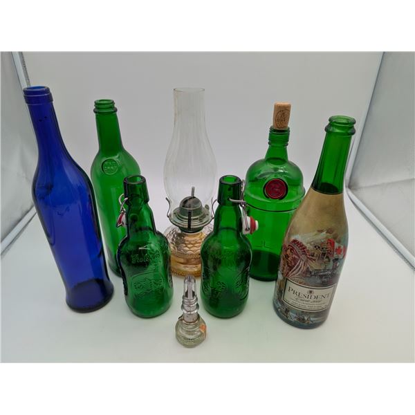 Colored Glass vintage bottles, and oil lamps