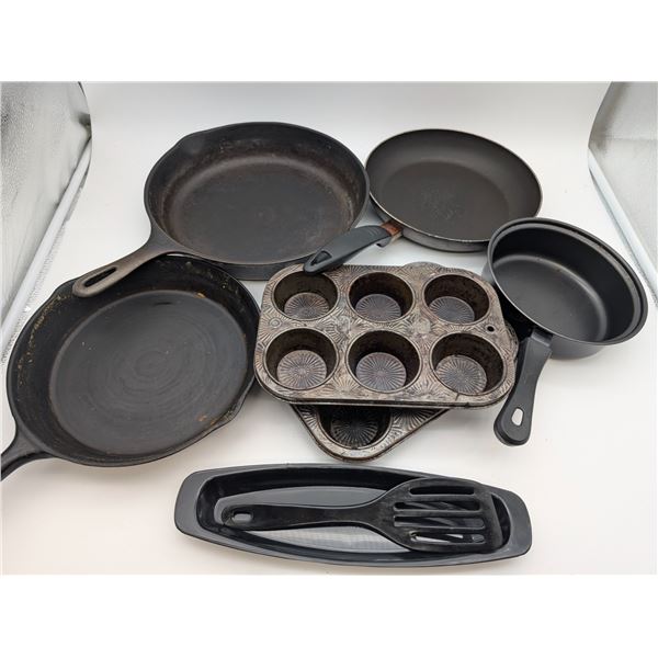 Collection of vintage Cast iron Skillets and baking pans