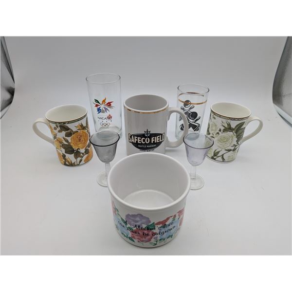Assortment of glass and ceramic drinking glasses