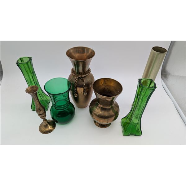 Green glass and brass vases