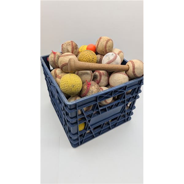 Milk crate full of Baseballs