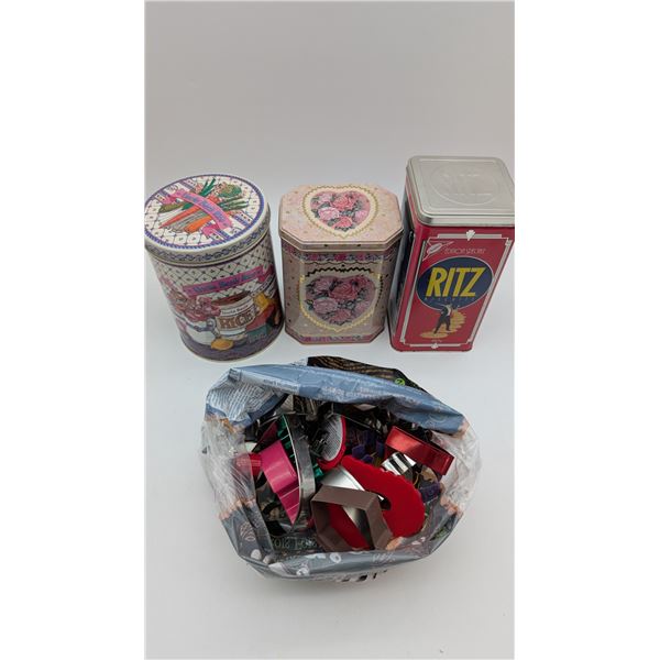 Metal tins with cookie cutters