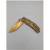 Image 1 : gold colored lockblade knife w/ samurai motif on handle (ck17)
