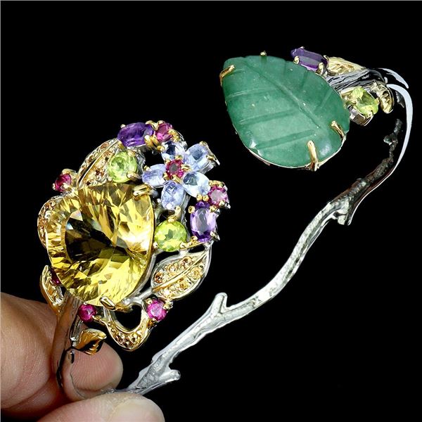 GORGEOUS BANGLE WITH HUGE EMERALD AND CITRINE STONES, PLUS AMAMETHYST, SAPPHIRE AND TANZANITE IN 14K