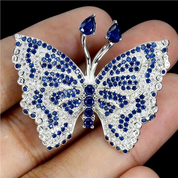 BUTTERFLY BROOCH WITH BLUE CUBIC ZIRCONIA IN 14K WHITE PLATED GOLD OVER 925 STERLING SILVER - APPRAI