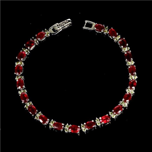 OVAL CUT RUBY BRACELET IN 14K WHITE PLATED GOLD OVER 925 STERLING SILVER - 7 INCHES LONG - APPRAISED