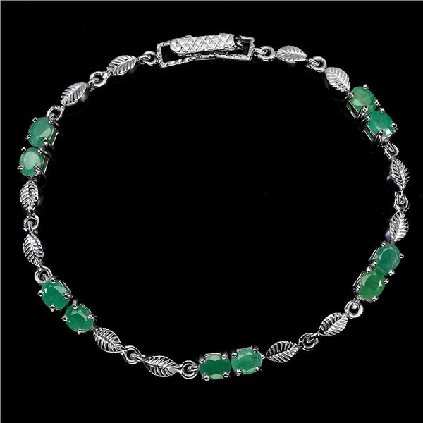 EMERALD BRACELET IN 14K WHITE PLATED GOLD OVER 925 STERLING SILVER - 7.5 INCHES LONG - APPRAISED REP